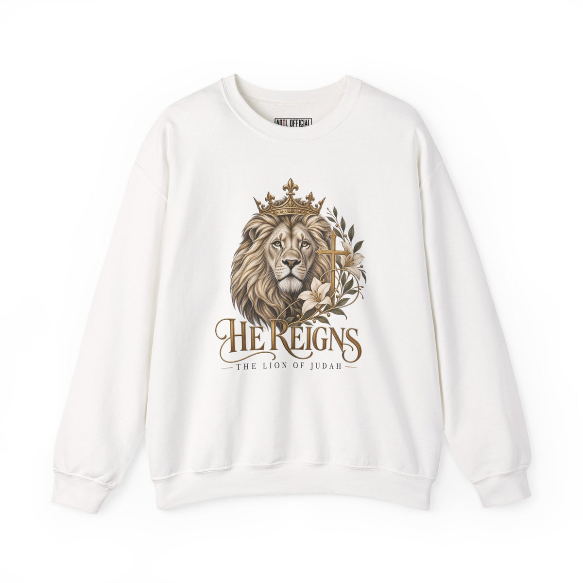 Lion of Judah — He Reigns Christian Sweatshirt. A majestic crowned lion, delicate white lilies, and an ornate gold cross create an elegant declaration of faith.