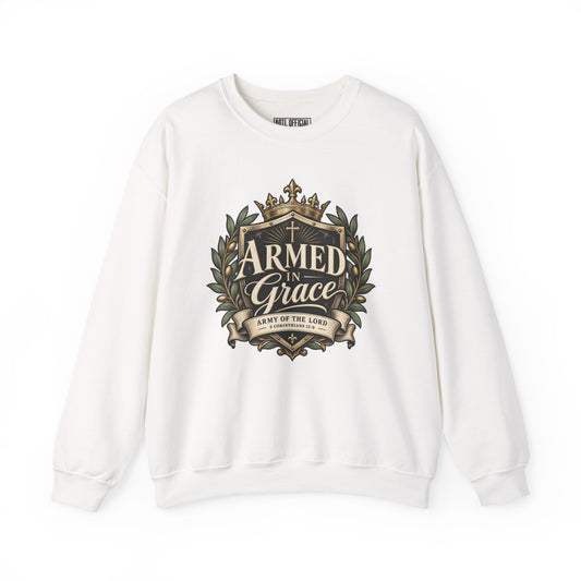 Armed in Grace Christian Sweatshirt. An elegant crowned shield, olive branches, and flowing lettering celebrate the strength found in God’s grace. 